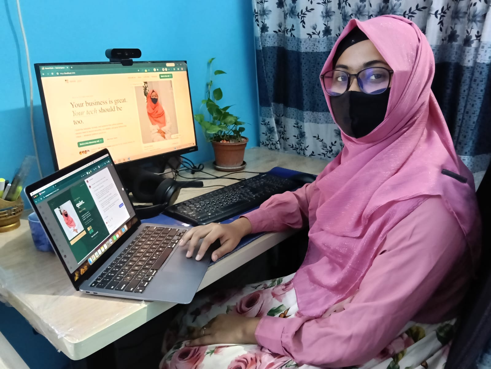 Nusrat at her desk